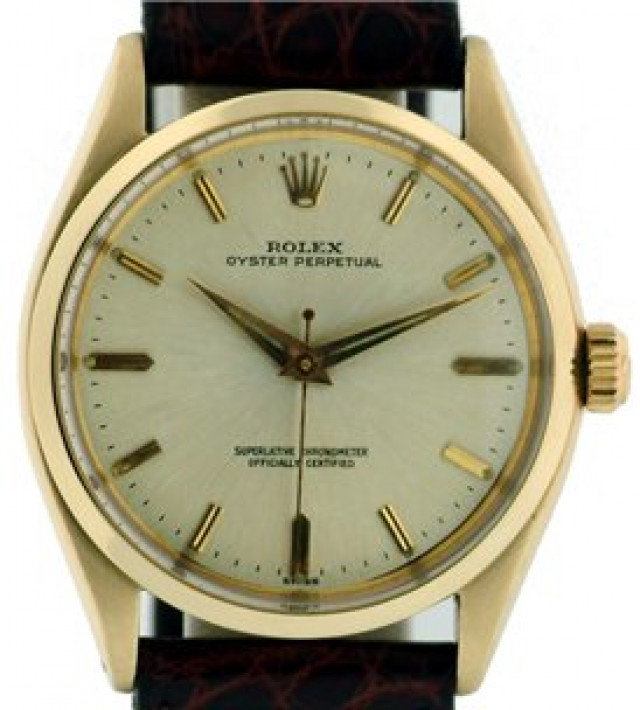 Rolex 1002 Yellow Gold on Strap, Smooth Bezel Steel with Gold Index